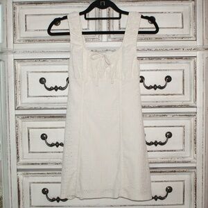 White dress with front bow